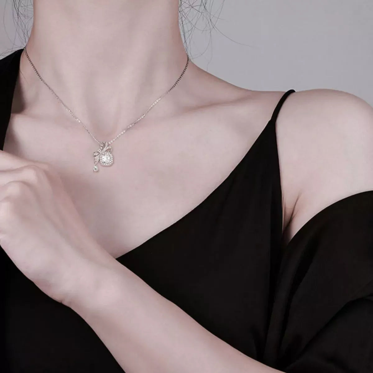 1.5 Carat Moissanite 925 Sterling Silver Bowknot Pendant Necklace Silver / One Size The Nichole Collection
