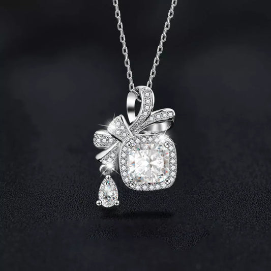 1.5 Carat Moissanite 925 Sterling Silver Bowknot Pendant Necklace Silver / One Size The Nichole Collection