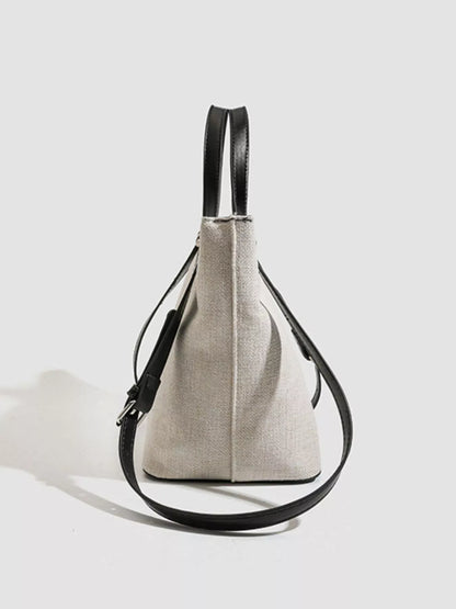 CANVAS CONTRAST-STRAP BUCKET TOTE The Nichole Collection - Official Site