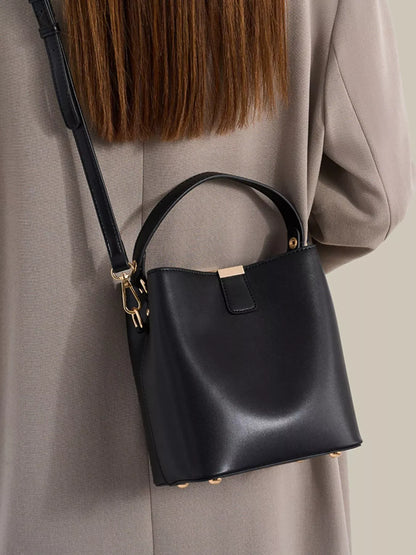 GOLD-TONE BUCKET CROSSBODY BAG The Nichole Collection - Official Site