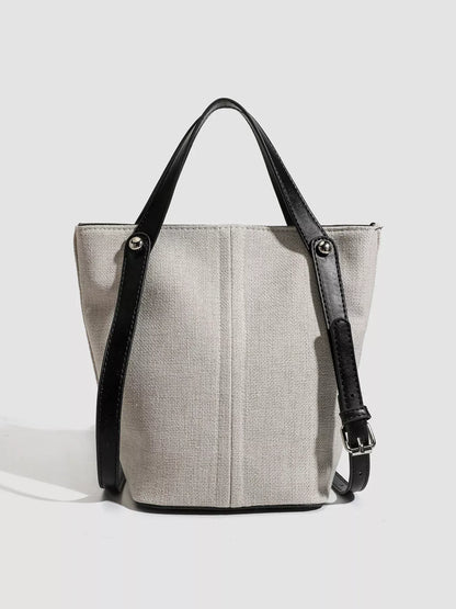 CANVAS CONTRAST-STRAP BUCKET TOTE The Nichole Collection - Official Site