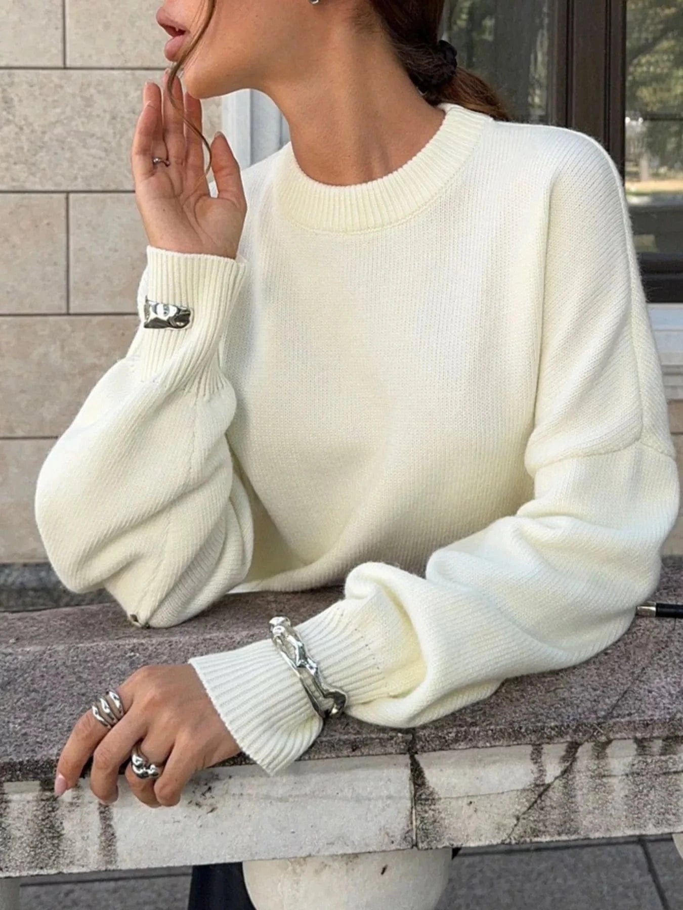 Cutout Round Neck Sweater with Faux Pearl Back Sweaters The Nichole Collection