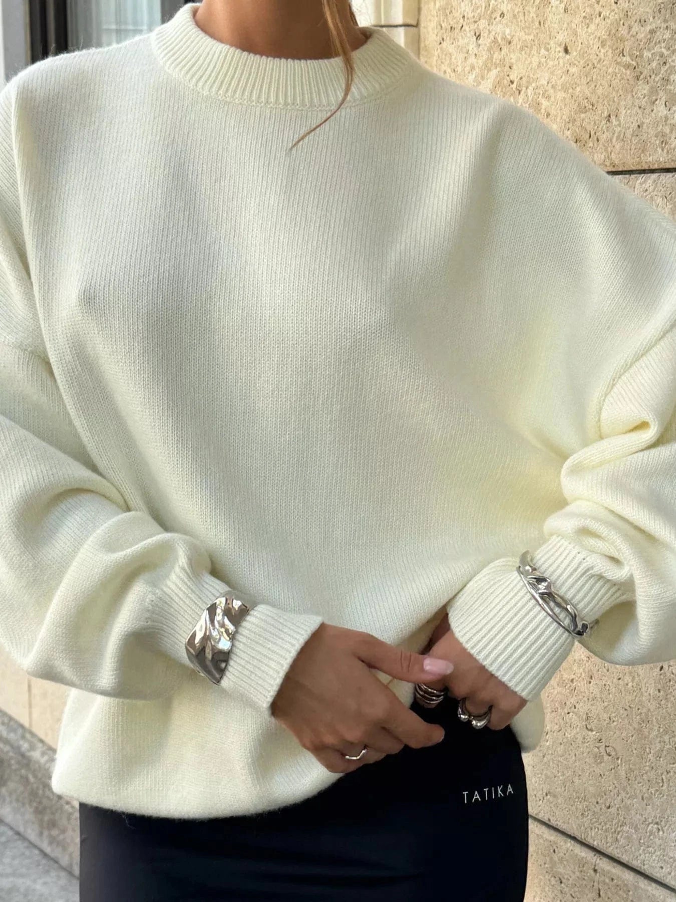 Cutout Round Neck Sweater with Faux Pearl Back Sweaters The Nichole Collection