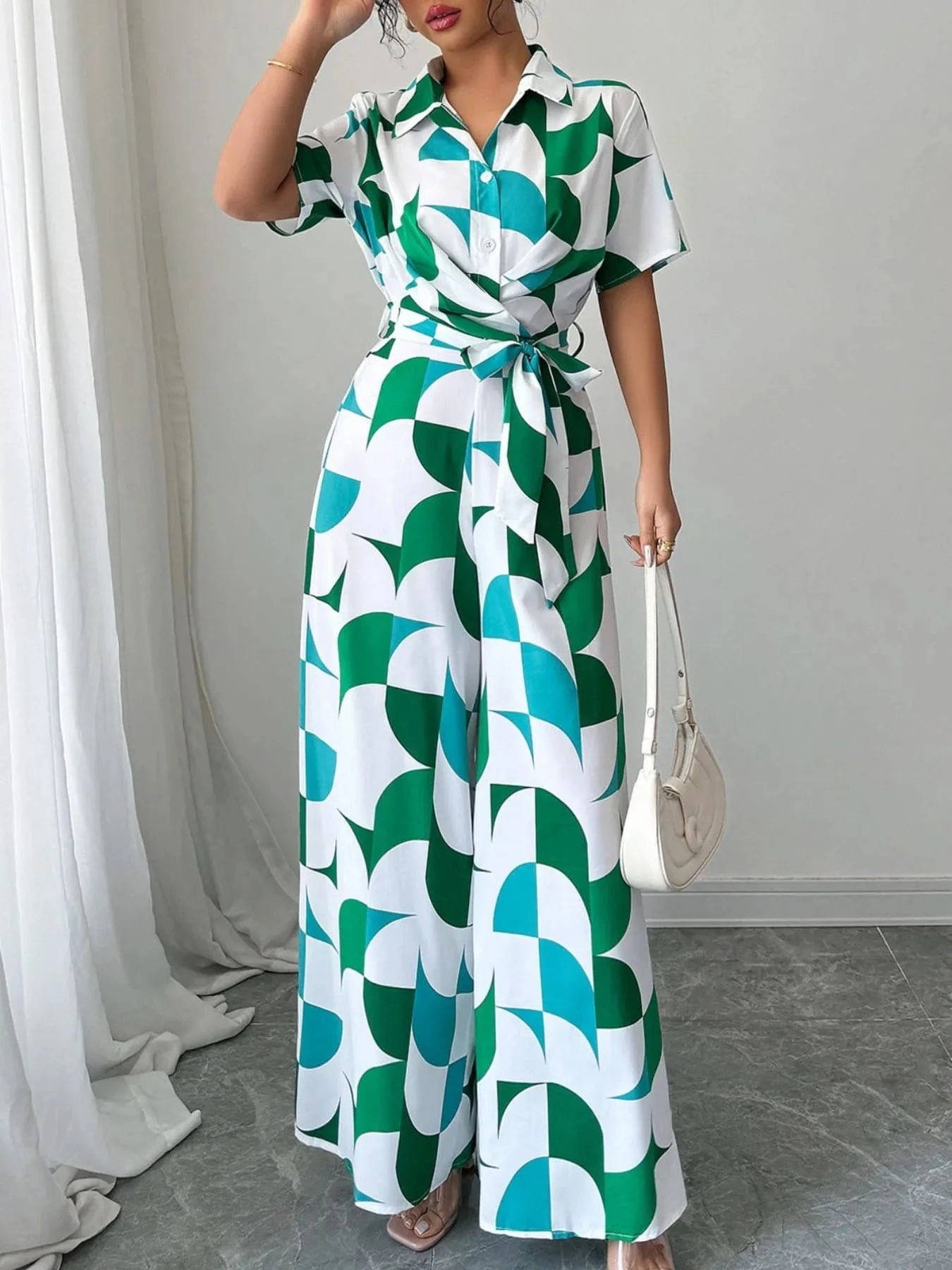 Printed Wide Leg Belted Jumpsuit The Nichole Collection