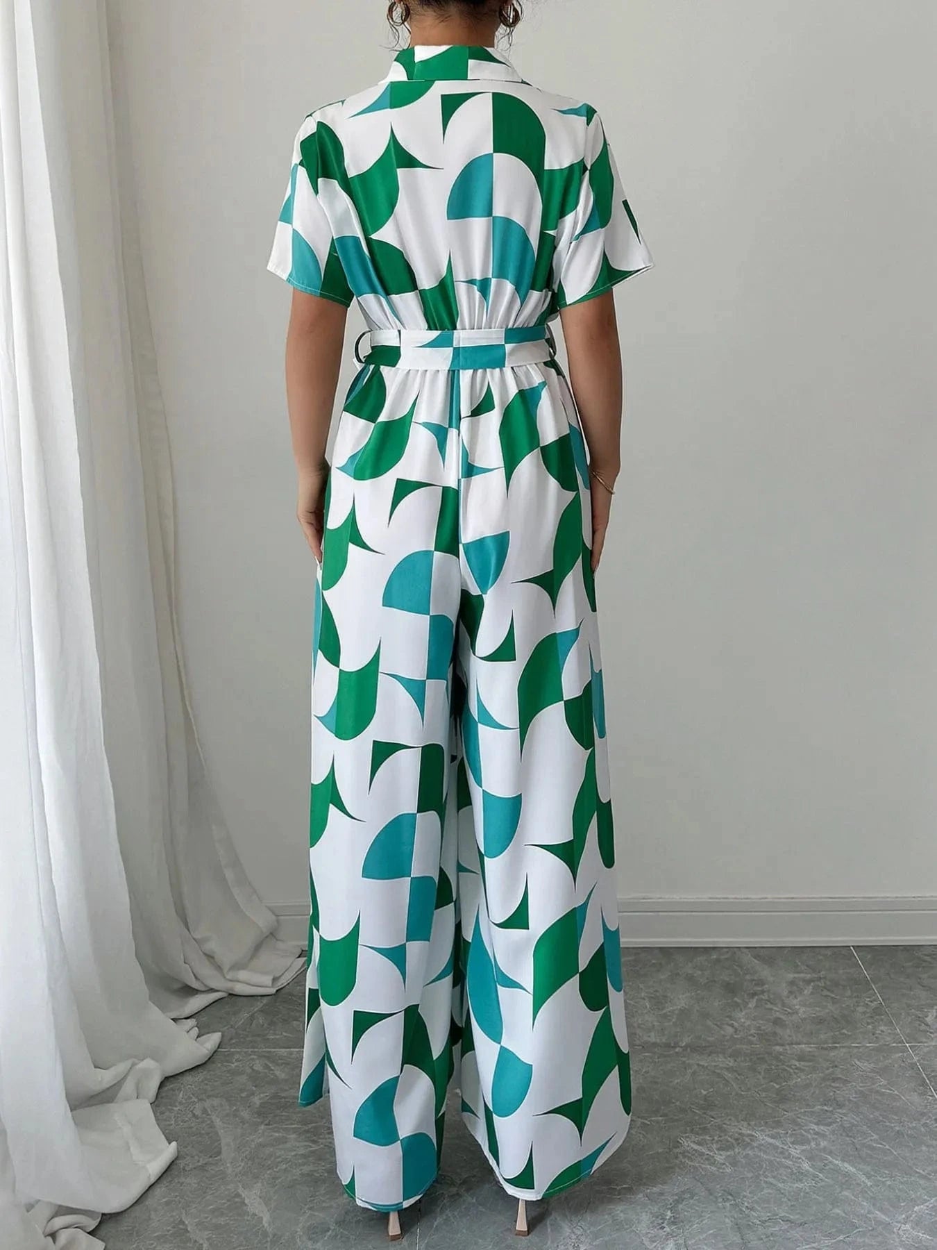 Printed Wide Leg Belted Jumpsuit The Nichole Collection
