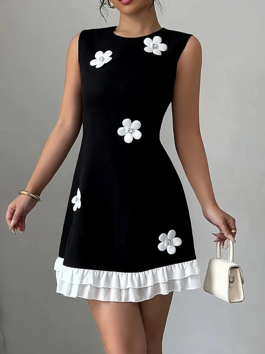 Retro Black Mini Dress with White 3D Floral Appliqués and Ruffle Hem Black / XS The Nichole Collection