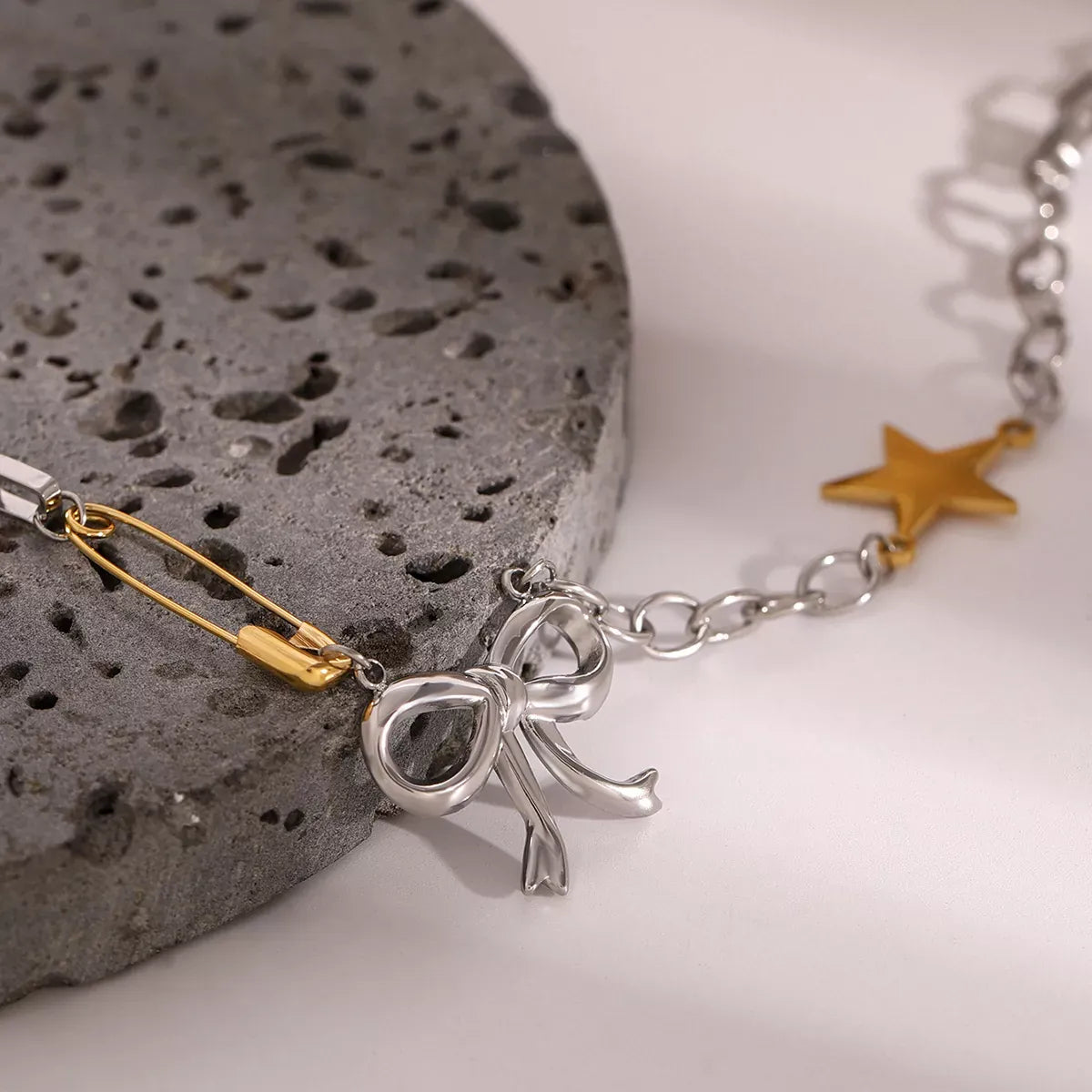 Two-Tone Bow Star Necklace Silver / One Size The Nichole Collection