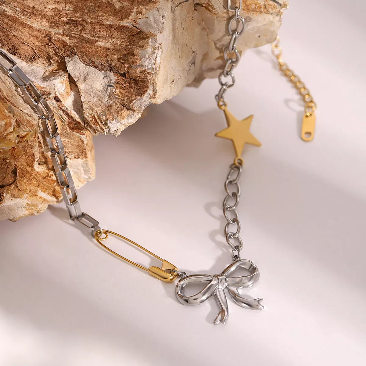 Two-Tone Bow Star Necklace Silver / One Size The Nichole Collection