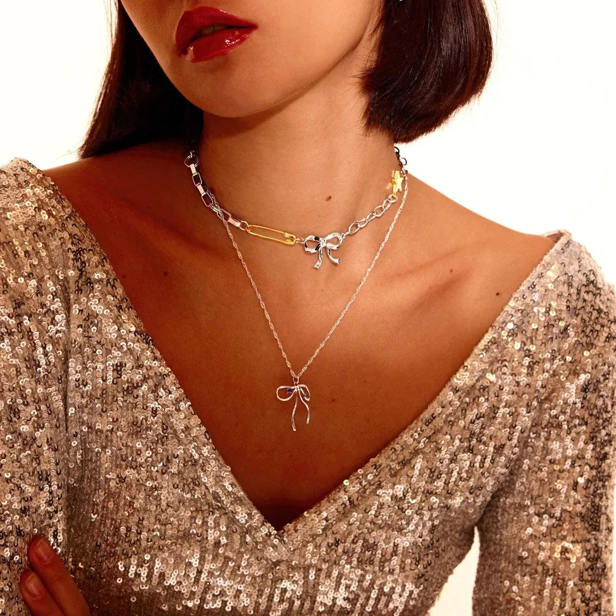 Two-Tone Bow Star Necklace Silver / One Size The Nichole Collection