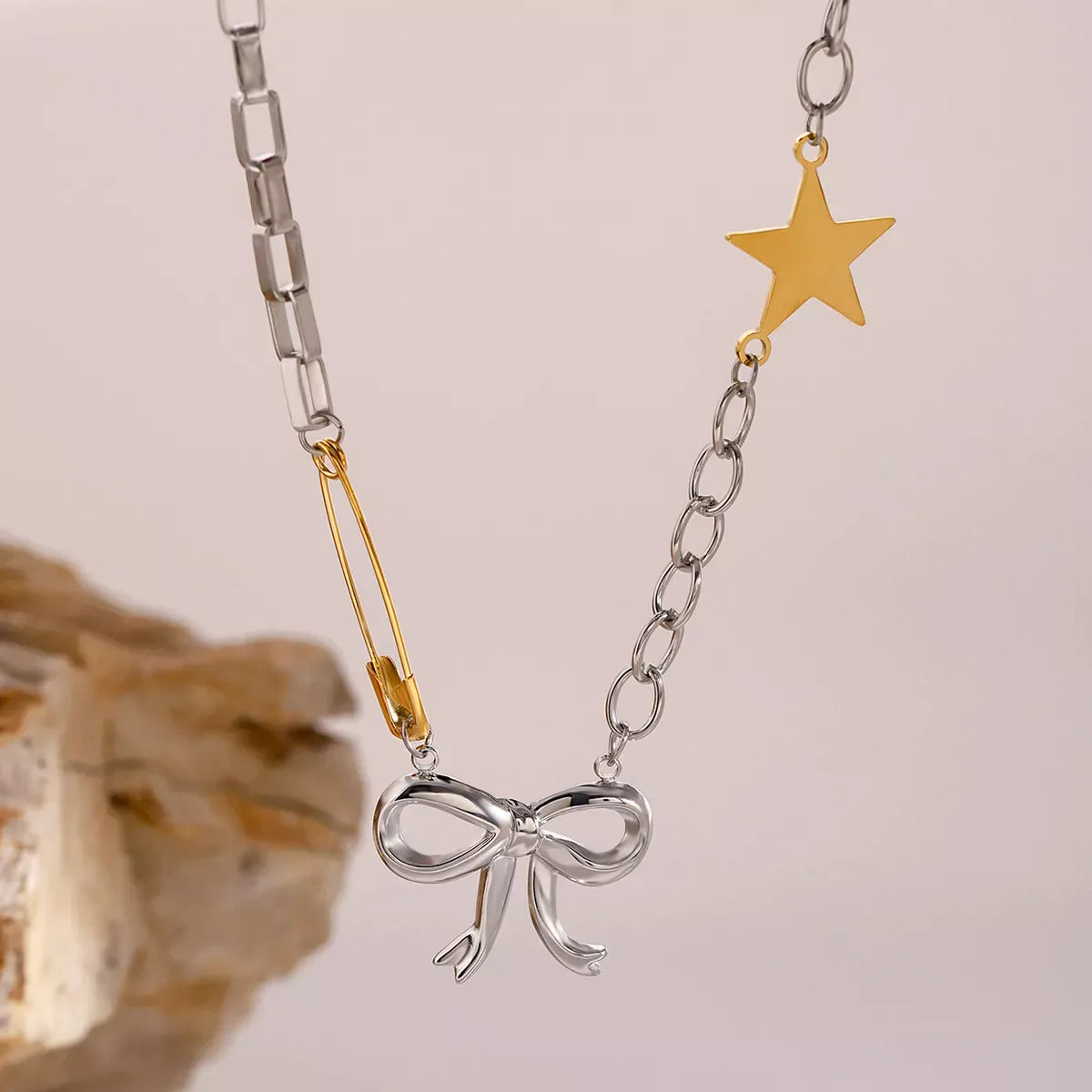 Two-Tone Bow Star Necklace Silver / One Size The Nichole Collection
