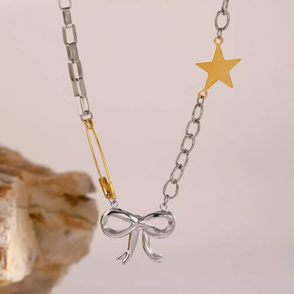 Two-Tone Bow Star Necklace Silver / One Size The Nichole Collection
